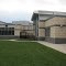 Back corner of Kroc Center near water area and classrooms