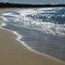 Dolphin Beach - Surf running back into sea