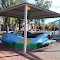 Colourful shaded shelter in median strip
