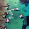 lobster boats dropping catch off to carting boat big rat island