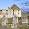 The headstones remain