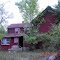 Side view of an old, red house on Allens Mill Road / SR-719.
