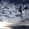 Cloudy sky and windmill