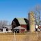 Green roof barn with silo