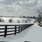 snow covered horse farm