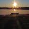 The sun rises on frozen Lake Lansing