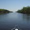 VIRGINIA: ATLANTIC INTRACOASTAL WATERWAY: ALBEMARLE AND CHESAPEAKE CANAL:  Tuna Tracker heading south down the canal