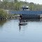 VIRGINIA: ATLANTIC INTRACOASTAL WATERWAY: ALBEMARLE AND CHESAPEAKE CANAL:  fishing beside the North Landing Swing Bridge