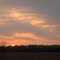 Sunset over a farmer's field