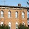 Arched Brick windows.
