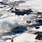 冬季冒烟的供热厂, 美国田纳西州 Smoking heat supplier on the snow covered plain, USA