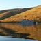Ship mirrored in the Snake River