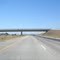 CA-99 passes under the new Avenue 21 1/2 overpass, which replaced all the at-grade intersections in 2008-2009. This section of CA-99 was made with interstate highway standards & is a lot wider than the rest of CA-99.  Taken on Sep 5 2011. Uploaded Jan 16 '12