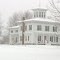 Old Michigan farmhouse in the snow