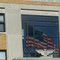 Flag Reflection in Court House Window