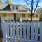 white picket fence and wrapping porch