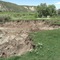 An Irrigation mishap, caused by gophers tunnels combined with irrigation. about half an acre, 12 feet deep of alfalfa field collapsed and washed out down the ditch and into Brush Creek