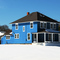 Blue House in Snow