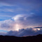 August thunderstorm silhouettes the northern Bridger Mountains
