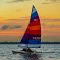 Red (and blue and orange) sails in the sunset