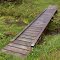 FLT O1 22.90 mi - Puncheon bridge, 21' long, 2x8x36 deck, two 8x6 stringers, 2x4 side deck boards, 2.5' to drainage