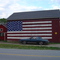 Barn with US flag along Route 82
