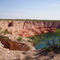 Sink Hole in Winkler County Texas called Wink Sink 2. The second of two sinks, this one is about 1000 feet in diameter. It covers approximately 18 acres, opened in 2004, and it appears to still be growing. This picture shows the vertical parting of the walls along the West and North walls. WARNING! This is NOT a tourists attraction.