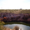 Wink Sink 1. This is the first of two sink holes in Winkler County Texas. WS1 opened in 1982 and is approximately 300 feet in diameter. At about 1.5 acres, WS1 is about 1/12 the areal extent of WS2. WS1 no longer produces catastrophic collapse but does have associated sag cracks that extend well beyond the actual hole. WARNING! This is NOT a tourists attraction.