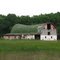 Sway back round roof barn
