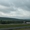 Cloudy skies and farm off 86