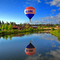 ReMax Balloon Floating Over the Deschutes River Next to the Old Mill Distric at the Balloons Over Bend Event