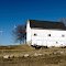 White Barn with wind farm