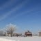 Frozen Farm under Blue Skies