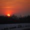SUNSET OVER THE SNOW