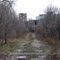 Hudson Motors Plant viewed from overgrown street where workers' housing used to be