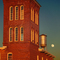 Between Sunset and Moonrise Stands The Prizery