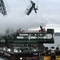 Setting up an event at a private residence on Lake Washington. The only access was from the water using this barge and crane. The last steam driven crane on the West coast.