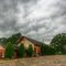 Calvary church and ominous clouds