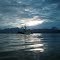 A fishing boat heading for port in Petersburg Alaska at sunrise. July 16, 2012