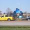 blue metal tripod sculpture in median at 119th and Metcalf, Overland Park,KS