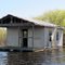 Floating Cabin On The River - Floats On Barrels