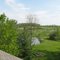 A pond and field along Pennemite Rd