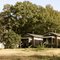 The filming location for parts of the 1994 movie, "The War" with Kevin Costner and Elijah Woods.  One of these shotgun houses served as the home of Stephen, Stu, Lois, and Lidia.
