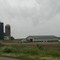 Silos and green-roofed barn