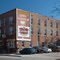 Wisconsin House: rooming house with ghost sign