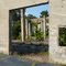 looking into the ruins of the old Charles Lambeth cotton warehouse in Littleton, with deteriorating concrete pillars supporting a roof that's no longer there, 7-27-11
