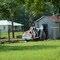 old out-of-commission Amoco gas station signs being stored in a yard in Littleton, NC, 7-27-11