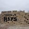 Train Hwy, limestone sculpture by Pete Felten, Hays, KS