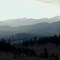 Teanaway Ridge and Mount Stuart in the distance from Hwy. 97.  Smoke haze from forest fires provides the soft tones.