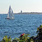 Sailboat By Lighthouse
